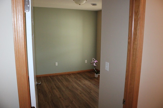 14257 184th Ave NW, Elk River, MN 55330 - spare room with dark wood-type flooring and baseboards