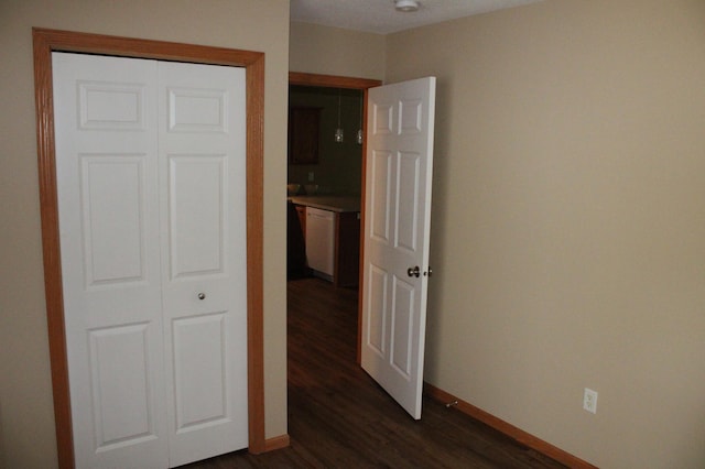 14257 184th Ave NW, Elk River, MN 55330 - unfurnished bedroom featuring dark wood-type flooring and baseboards