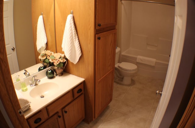 14257 184th Ave NW, Elk River, MN 55330 - bathroom featuring toilet, vanity, shower / washtub combination, and tile patterned floors