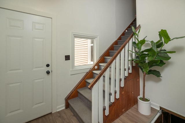 1126 7th Ave SE, Rochester, MN 55904 - stairway with wood finished floors and baseboards