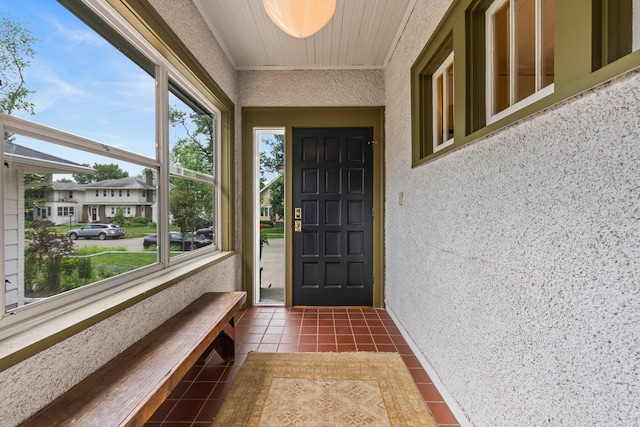 4817 Emerson Ave S, Minneapolis, MN 55419 - tiled entryway featuring healthy amount of natural light and ornamental molding