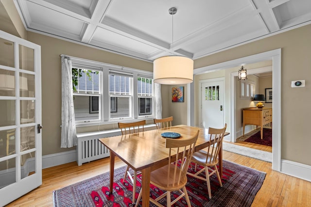 4817 Emerson Ave S, Minneapolis, MN 55419 - dining space featuring coffered ceiling, radiator heating unit, light wood-style floors, and beam ceiling