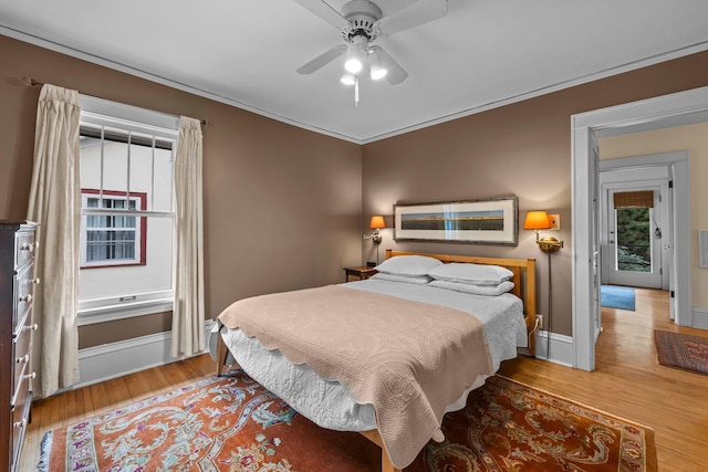 4817 Emerson Ave S, Minneapolis, MN 55419 - bedroom with wood finished floors, ornamental molding, and ceiling fan