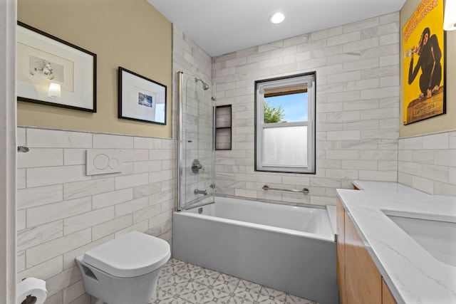 4817 Emerson Ave S, Minneapolis, MN 55419 - bathroom with tile walls, vanity, shower / bathtub combination, tile patterned floors, and recessed lighting