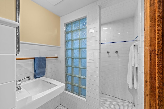 4817 Emerson Ave S, Minneapolis, MN 55419 - full bath with tile walls, a tile shower, and wainscoting