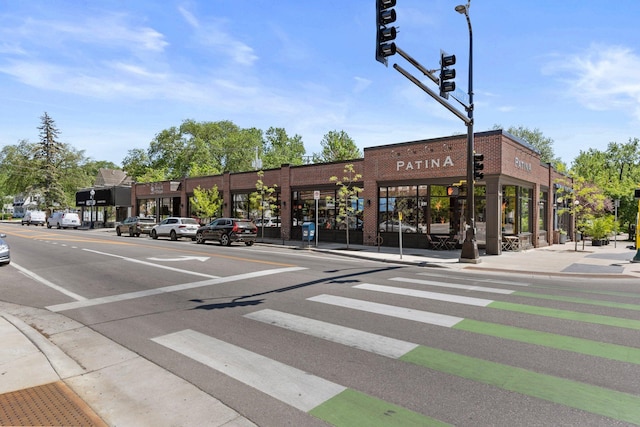 4817 Emerson Ave S, Minneapolis, MN 55419 - view of asphalt road with sidewalks, traffic lights, street lights, and curbs
