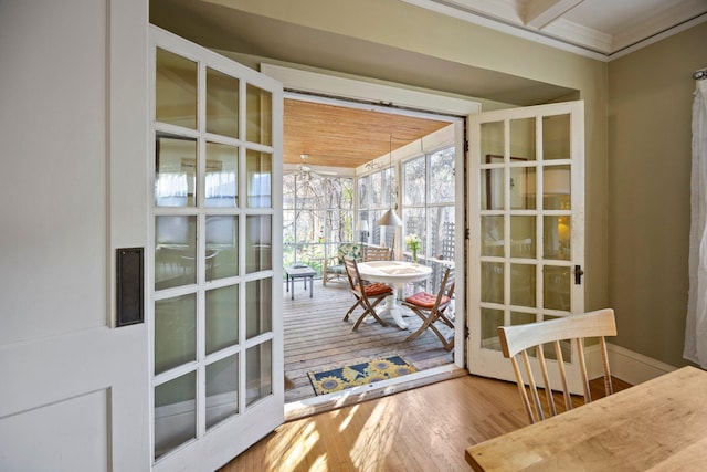 4817 Emerson Ave S, Minneapolis, MN 55419 - doorway to outside featuring hardwood / wood-style flooring and crown molding