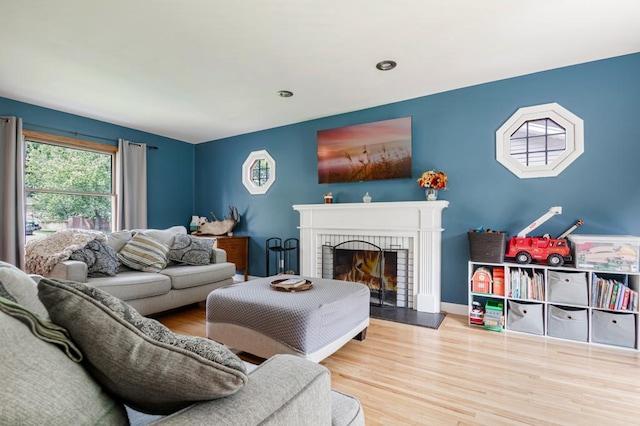 569 Driftwood Rd, New Brighton, MN 55112 - living room with a brick fireplace, wood finished floors, and recessed lighting