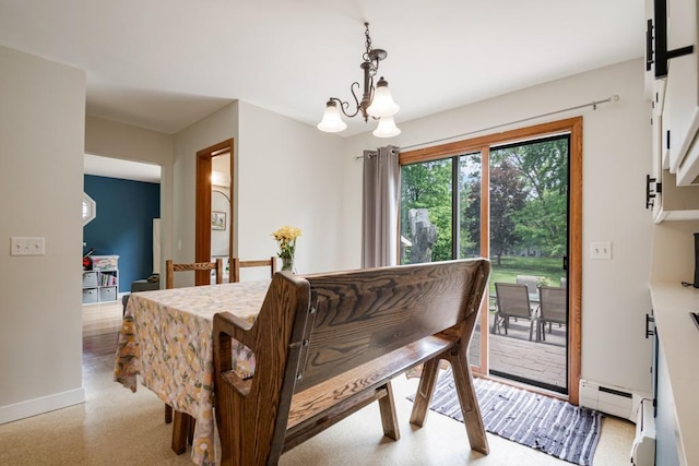 569 Driftwood Rd, New Brighton, MN 55112 - dining space featuring baseboard heating, a chandelier, and baseboards