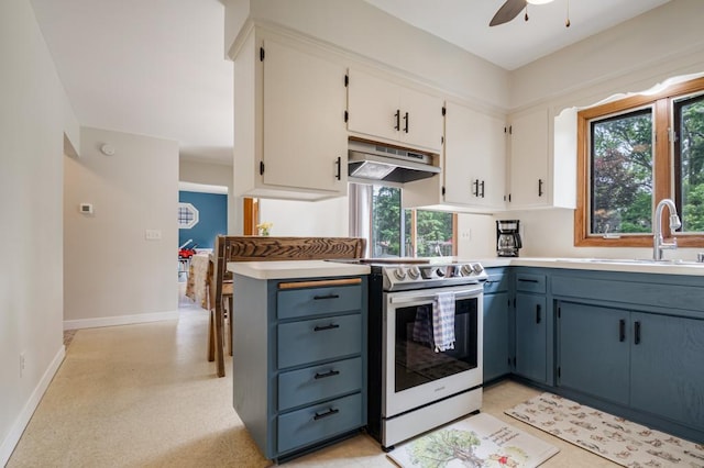569 Driftwood Rd, New Brighton, MN 55112 - kitchen featuring under cabinet range hood, electric range, a sink, and plenty of natural light