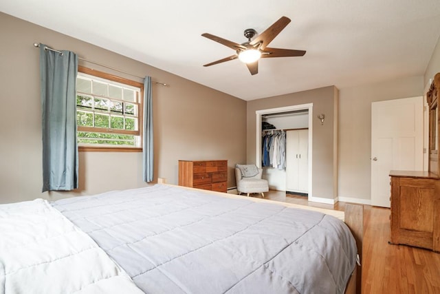 569 Driftwood Rd, New Brighton, MN 55112 - bedroom featuring wood finished floors, a closet, a ceiling fan, and baseboards