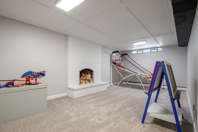 569 Driftwood Rd, New Brighton, MN 55112 - recreation room featuring carpet floors, baseboards, and a brick fireplace