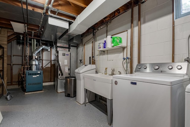 569 Driftwood Rd, New Brighton, MN 55112 - unfinished below grade area with concrete block wall, heating unit, washer and dryer, a water softener, and a sink