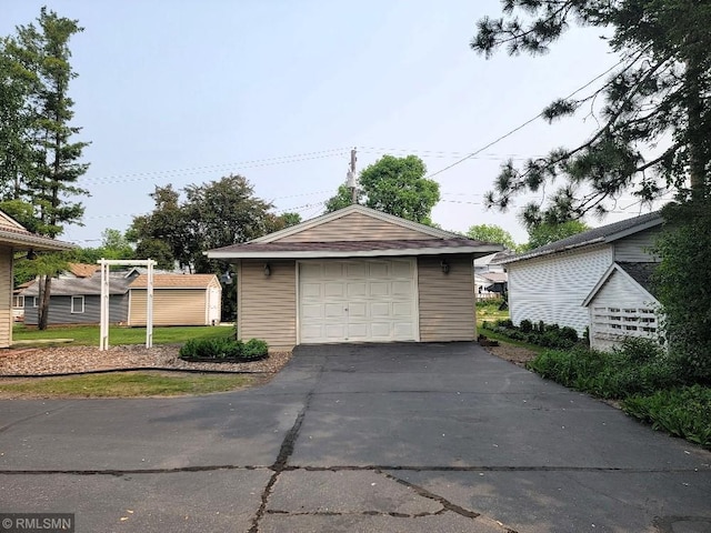 109 Jackson St W, Eagle Bend, MN 56446 - detached garage with asphalt driveway