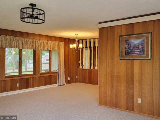 109 Jackson St W, Eagle Bend, MN 56446 - carpeted spare room with a chandelier, wooden walls, a baseboard radiator, and baseboards