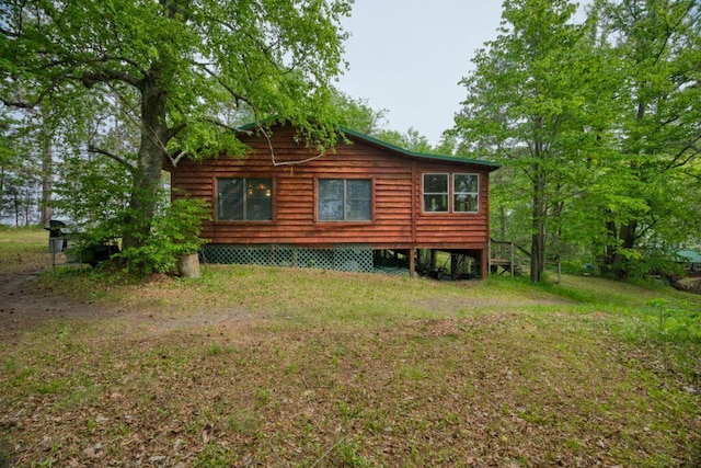 30901 Sunny Beach Rd, Grand Rapids, MN 55744 - view of side of home featuring a yard