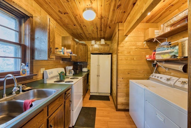30901 Sunny Beach Rd, Grand Rapids, MN 55744 - laundry room featuring independent washer and dryer, wooden ceiling, light wood-type flooring, and wood walls