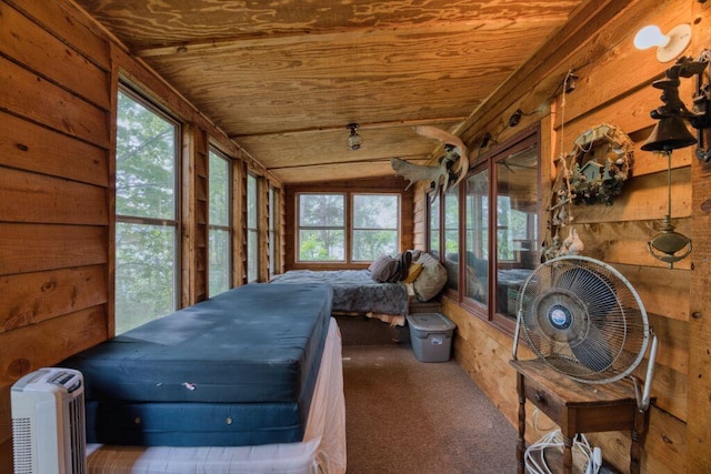 30901 Sunny Beach Rd, Grand Rapids, MN 55744 - sunroom featuring wooden ceiling, carpet floors, wood walls, and lofted ceiling