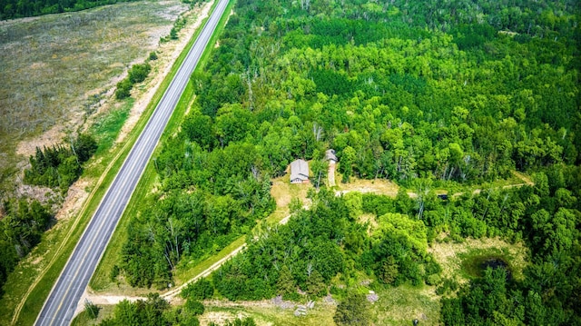 15989 Lost Oaks Dr SE, Cass Lake, MN 56633 - aerial view of property and surrounding area featuring a heavily wooded area and a major roadway