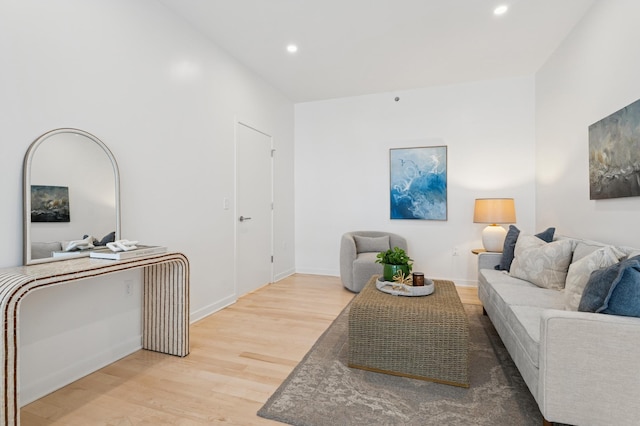 3104 Lake St Unit 412, Minneapolis, MN 55416 - living room with light wood-style floors, recessed lighting, and baseboards
