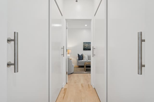 3104 Lake St Unit 412, Minneapolis, MN 55416 - hallway featuring light wood-type flooring