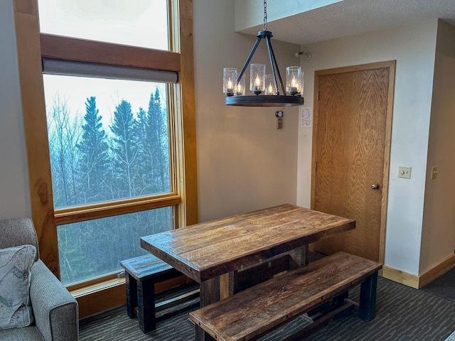 122 Bridge Run Ln Unit A, Lutsen Twp, MN 55615 - dining space with a chandelier and baseboards