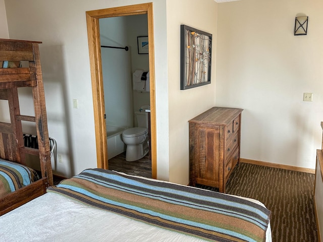 122 Bridge Run Ln Unit A, Lutsen Twp, MN 55615 - bedroom with ensuite bathroom, carpet, and baseboards