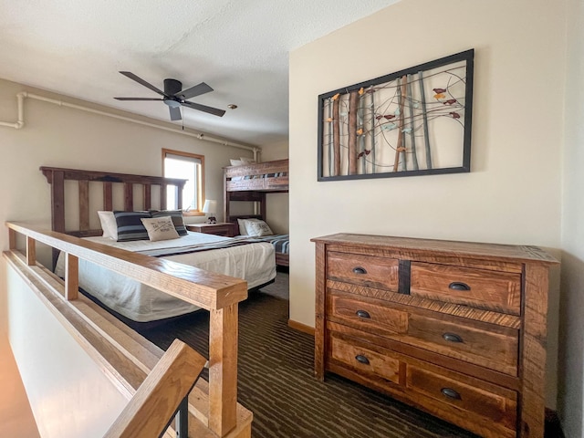 122 Bridge Run Ln Unit A, Lutsen Twp, MN 55615 - bedroom featuring dark colored carpet and ceiling fan