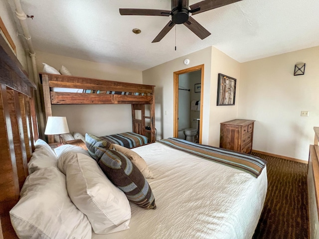 122 Bridge Run Ln Unit A, Lutsen Twp, MN 55615 - bedroom featuring carpet flooring, ensuite bathroom, baseboards, and a ceiling fan