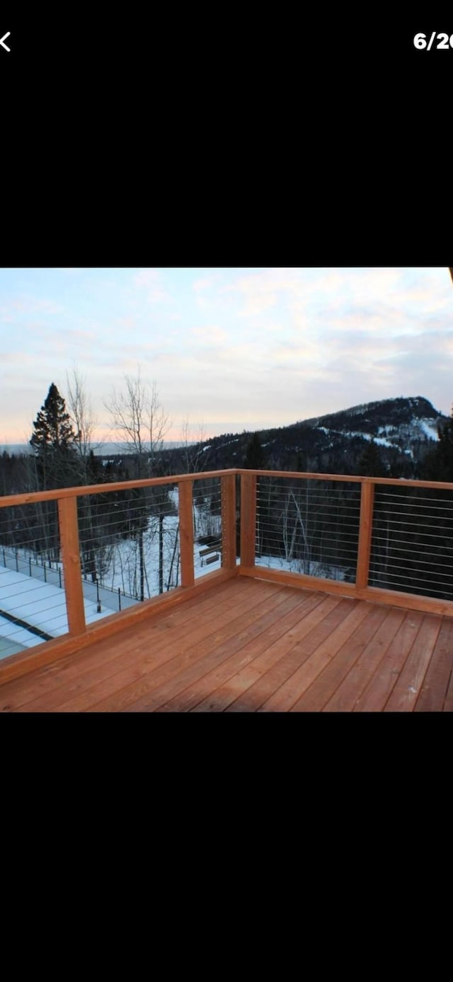 122 Bridge Run Ln Unit A, Lutsen Twp, MN 55615 - dock area with a balcony and a mountain view