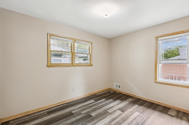 348 6th Ave S, Saint Cloud, MN 56301 - empty room featuring wood finished floors and baseboards