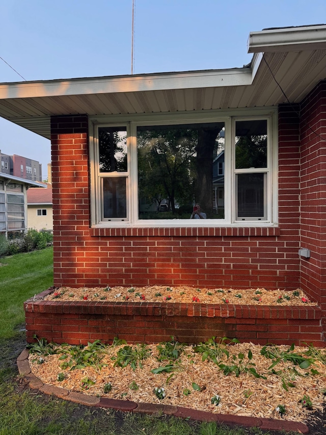 348 6th Ave S, Saint Cloud, MN 56301 - view of side of home featuring brick siding