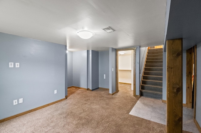 618 Park St, Alexandria, MN 56308 - finished basement featuring carpet, stairway, and baseboards