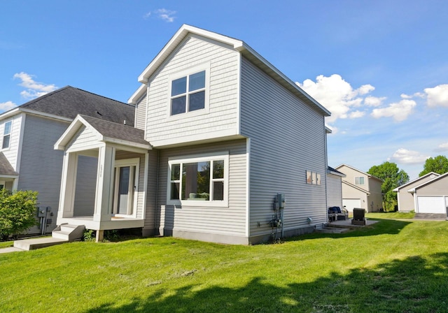 2908 Mark Twain Dr, Chaska, MN 55318 - back of property featuring a yard and roof with shingles
