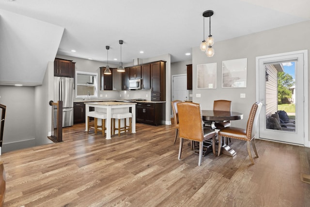 2908 Mark Twain Dr, Chaska, MN 55318 - dining space featuring light wood finished floors, recessed lighting, and baseboards