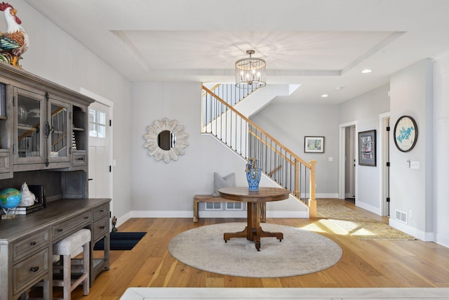 3100 Island View Dr, Mound, MN 55364 - entrance foyer with stairway, recessed lighting, a chandelier, baseboards, and light wood-style floors