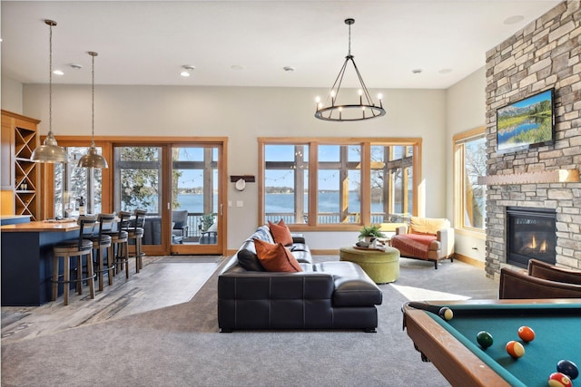 3100 Island View Dr, Mound, MN 55364 - living room featuring plenty of natural light, bar, a fireplace, and carpet flooring