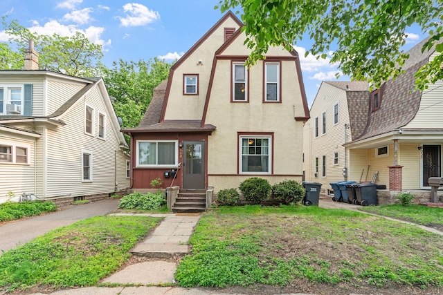 662 24th Ave NE, Minneapolis, MN 55418 - dutch colonial with stucco siding