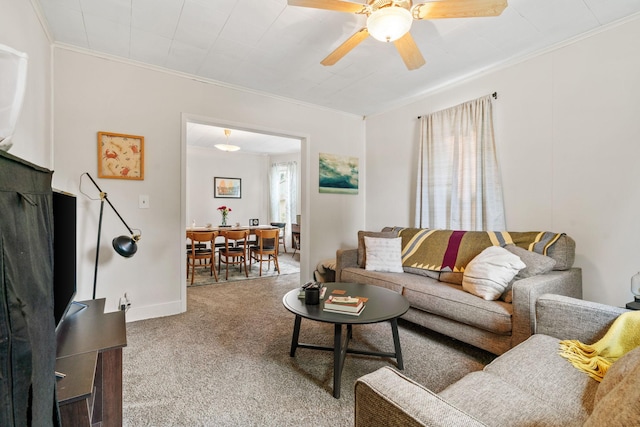 662 24th Ave NE, Minneapolis, MN 55418 - carpeted living area featuring crown molding, ceiling fan, and baseboards