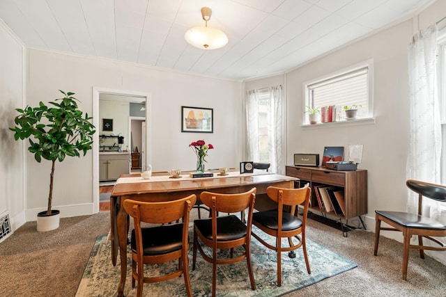 662 24th Ave NE, Minneapolis, MN 55418 - carpeted dining room featuring ornamental molding