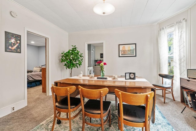 662 24th Ave NE, Minneapolis, MN 55418 - dining area with crown molding and light carpet