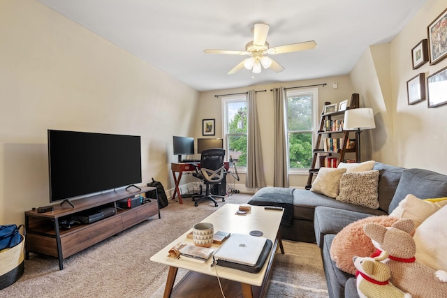 662 24th Ave NE, Minneapolis, MN 55418 - carpeted living room featuring a ceiling fan and a desk