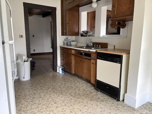 845 12th St, Windom, MN 56101 - kitchen featuring white appliances, a sink, and light countertops