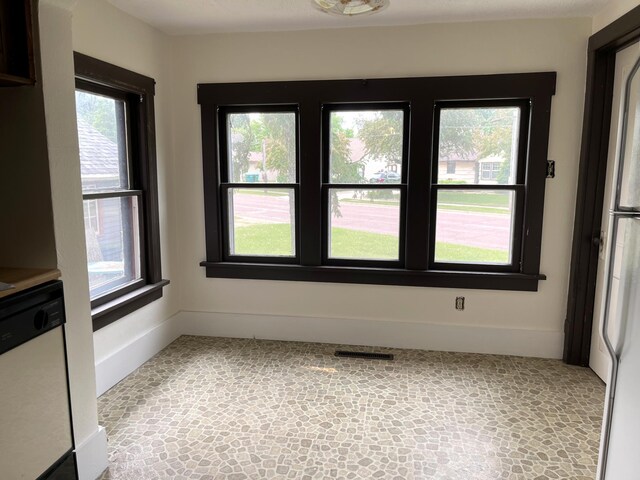 845 12th St, Windom, MN 56101 - unfurnished dining area featuring healthy amount of natural light
