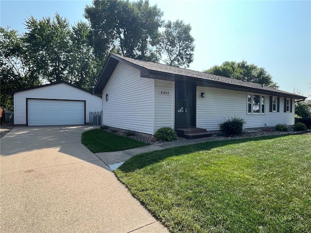 8499 Heron Ave S, Cottage Grove, MN 55016 - ranch-style home with a garage, a front lawn, and an outbuilding
