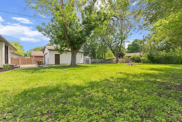 8499 Heron Ave S, Cottage Grove, MN 55016 - fenced backyard featuring a shed