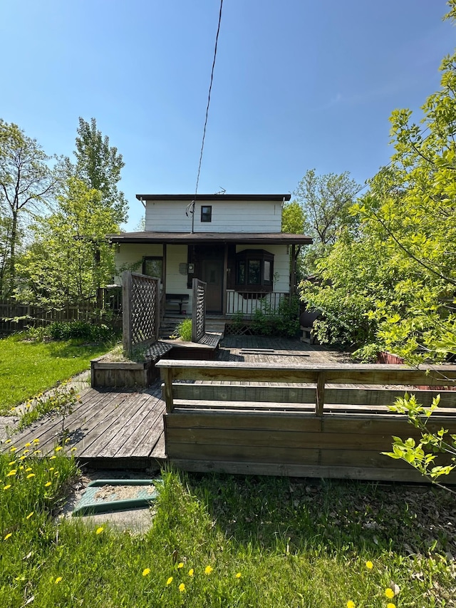 1004 9th St 1006, International Falls, MN 56649 - rear view of property featuring covered porch