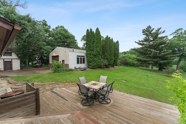 7567 Lent Trl, Lent Twp, MN 55079 - wooden deck with an outdoor structure, outdoor dining area, and a yard