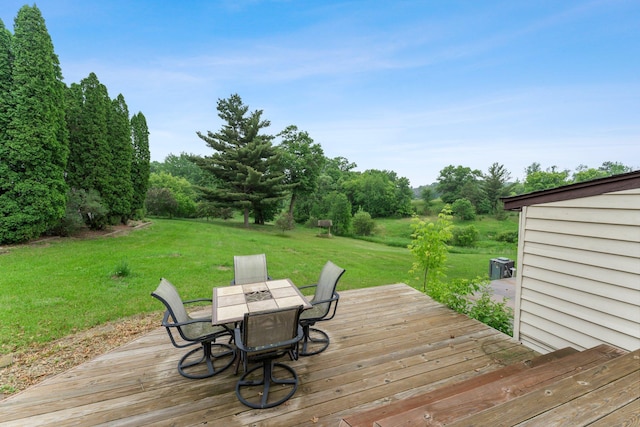 7567 Lent Trl, Lent Twp, MN 55079 - deck with outdoor dining area and a lawn