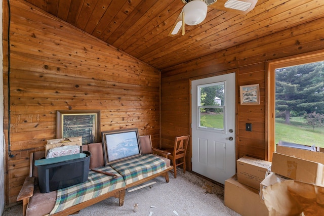 7567 Lent Trl, Lent Twp, MN 55079 - living area with lofted ceiling, carpet floors, wooden ceiling, wood walls, and ceiling fan